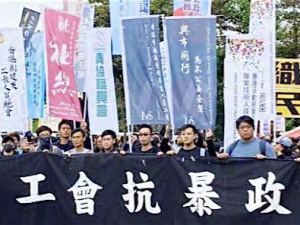 CHINA/HONG-KONG: Tres militantes fueron condenados a prisión el 2 de diciembre