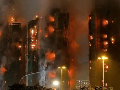 China: En el incendio de Hong Kong, los trabajadores en primera línea.